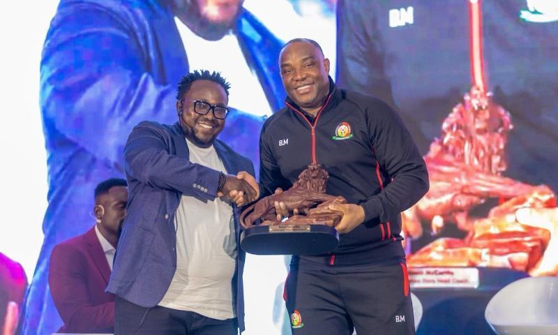 Odibets General Manager Dedan Mungai with Harambee Stars coach Bennie McCarthy.